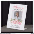 elegant_pink_floral_share_a_memory_pedestal_sign-r_ic54i0_1500.webp