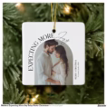 modern_expecting_more_joy_baby_photo_christmas_ceramic_ornament-r79f27d1b5ab64d0f99a4d4d7a2112642_05wkv_8byvr_1500.webp