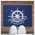 nautical_ships_wheel_welcome_aboard_navy_blue_doormat-r_ipc0pm_1500.webp
