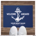 welcome_aboard_nautical_navy_blue_boat_name_doormat-r_ipc0y4_1500.webp